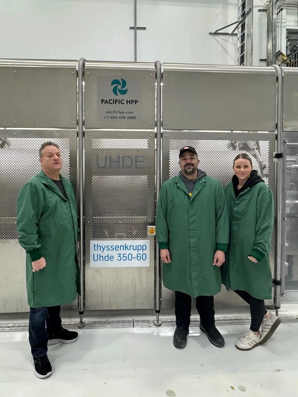 The Pacific HPP team in front of their HPP processing equipment